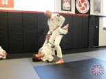 Breaking Closed Guard by Standing with Same-Side Grip